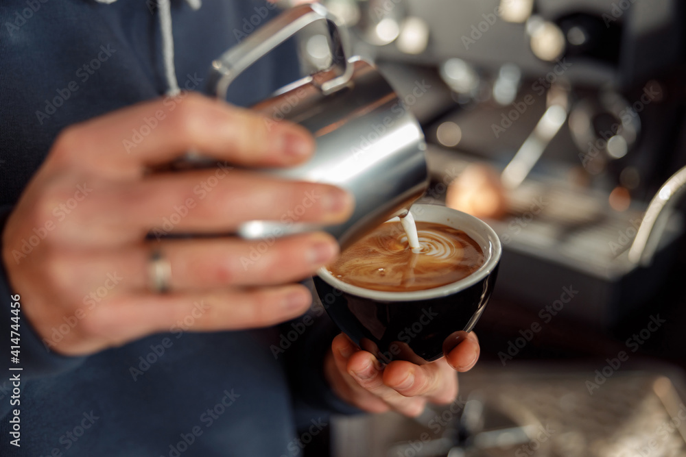 Happy smiling professional barista in cafe Happy smiling professional barista in cafe