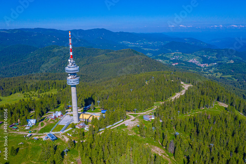 Telecommunications tower at Snezhanka peak near Pamporovo in Bulgaria photo