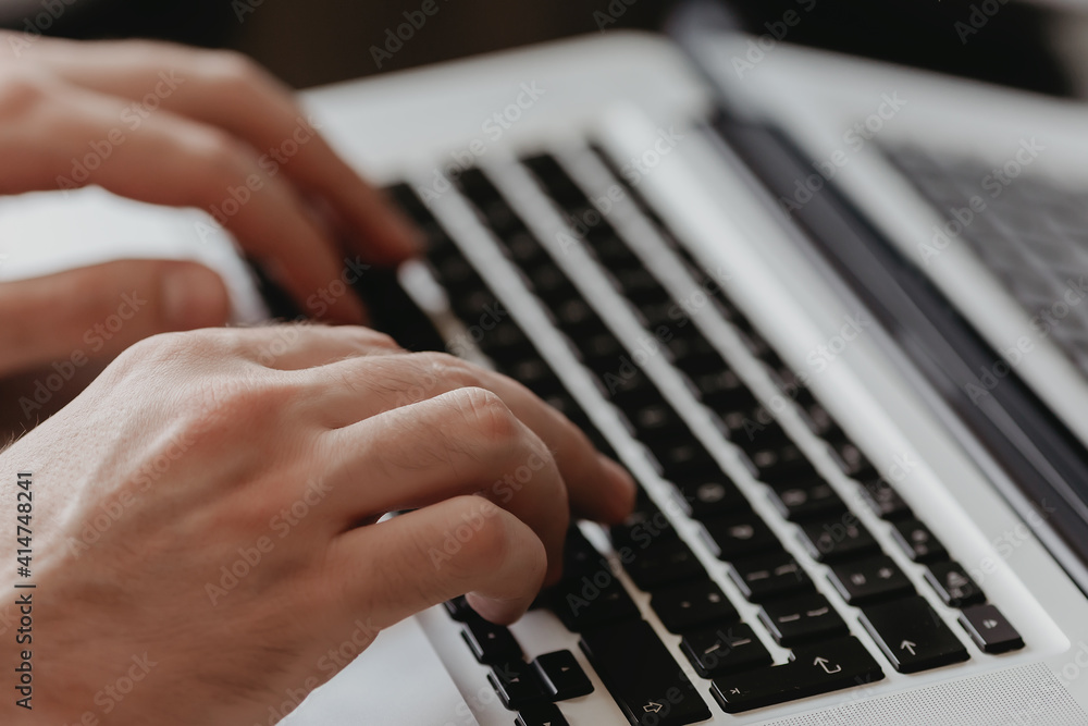 Male hand typing on keyboard concept. Male hand typing on keyboard concept.
