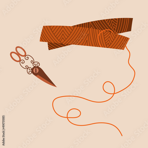 Spools of brown thread and scissors. Sewing accessories. Two skeins of thread. Vintage scissors.