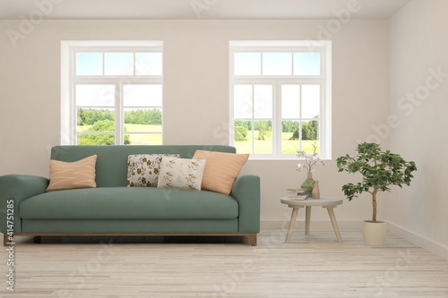 White living room with sofa and summer landscape in window. Scandinavian interior design. 3D illustration