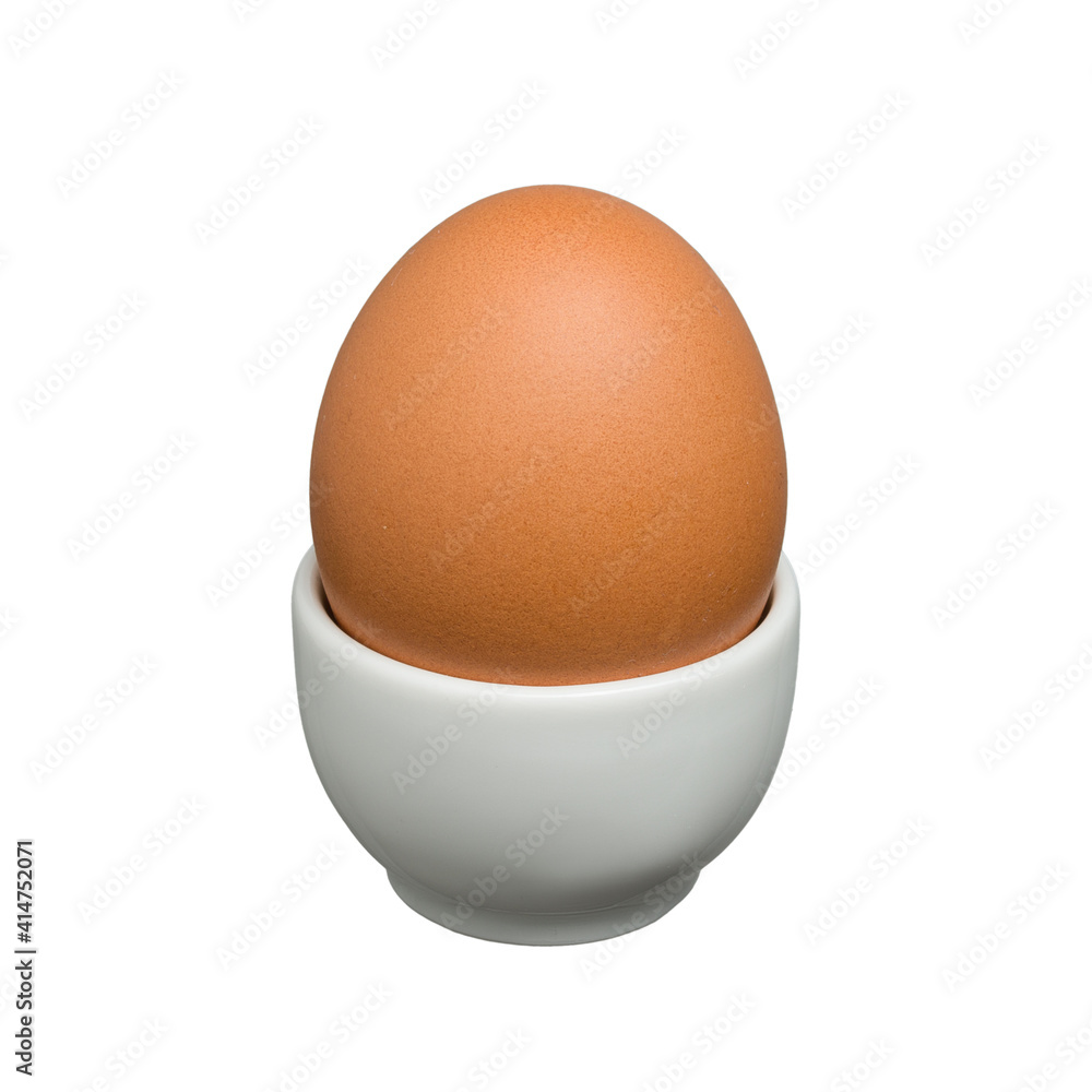 egg in a stand on a white background egg in a stand on a white background