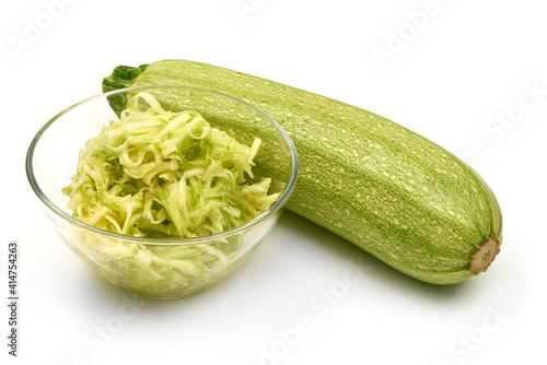 Grated zucchini, isolated on white background