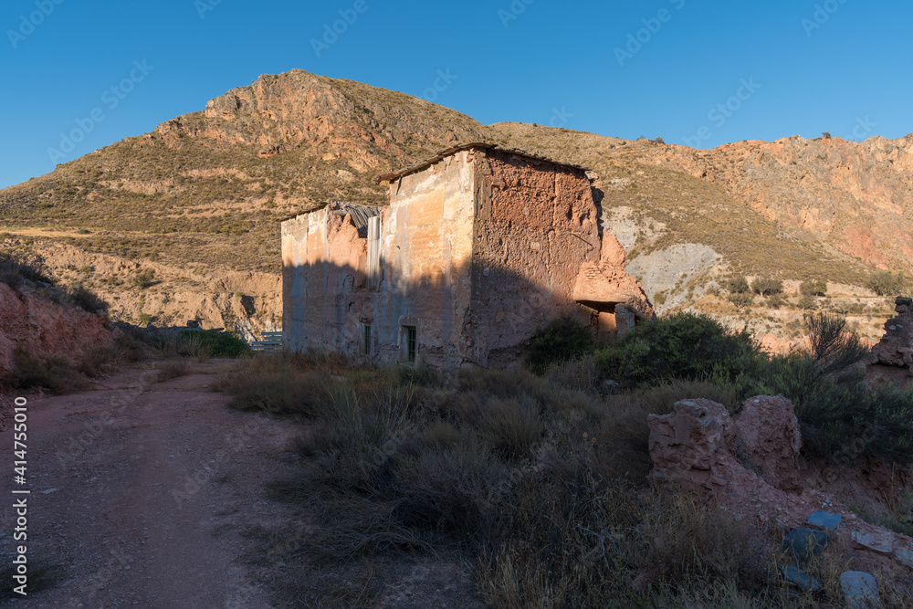 Ruined and abandoned farmhouse on a mountain in southern Spain