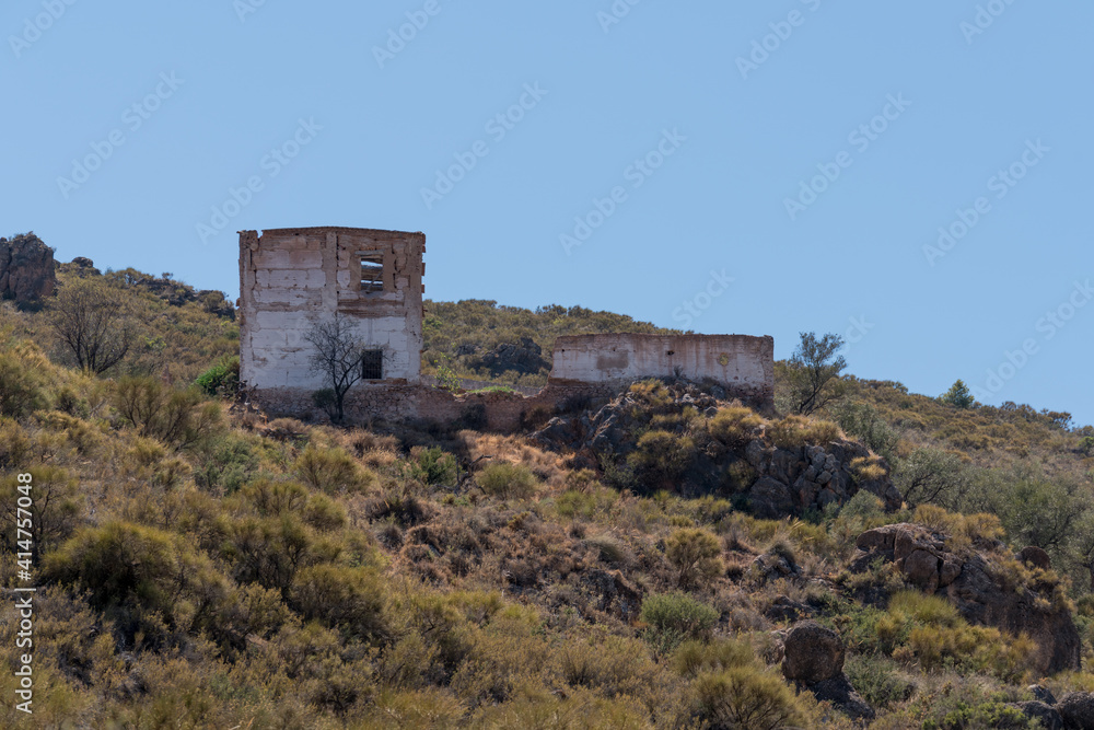 Ruined and abandoned farmhouse on a mountain in southern Spain