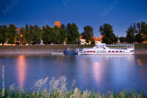 Night view of a ship moored...