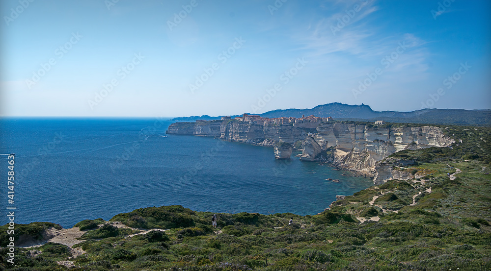 Blue Mediterranean sea in front of the Cliffs and town of Bonifacio on a beautiful spring day