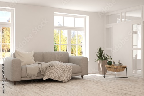 Stylish room in white color with sofa and autumn landscape in window. Scandinavian interior design. 3D illustration © AntonSh