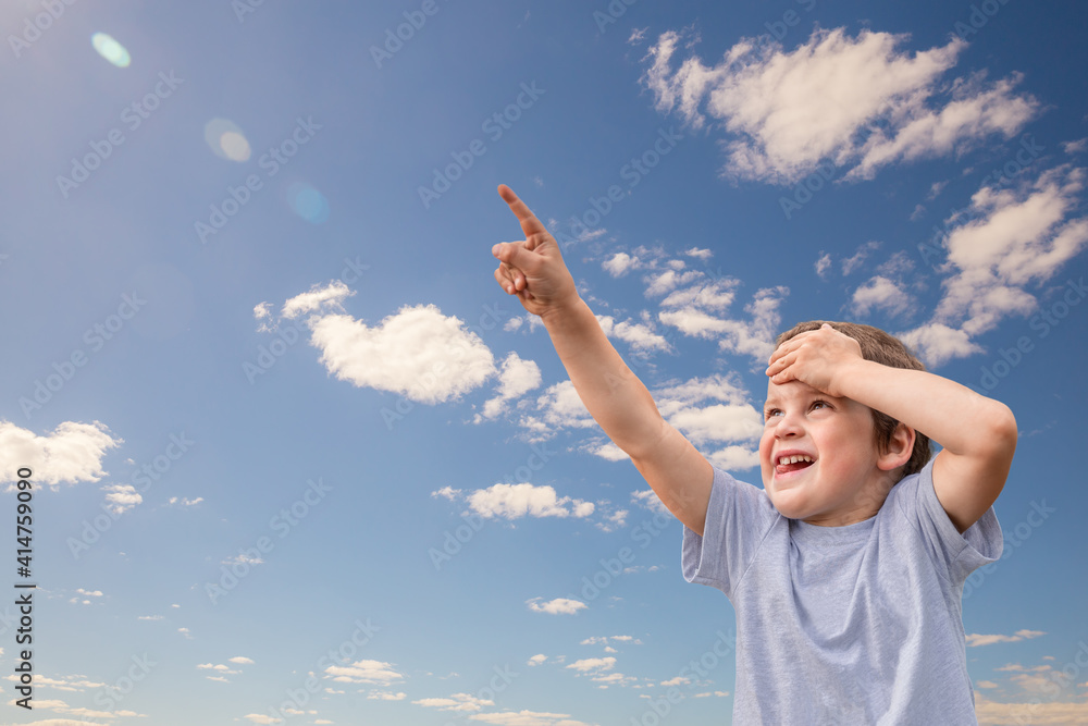 Child points up with a finger