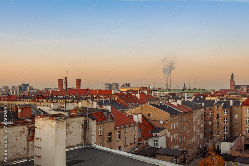 beautiful sunset and view of the rooftops of the city wroclaw poland