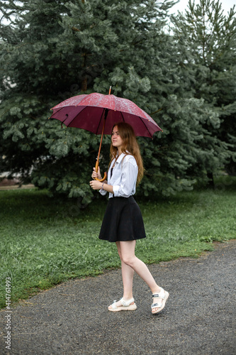 girl with umbrella in the rain