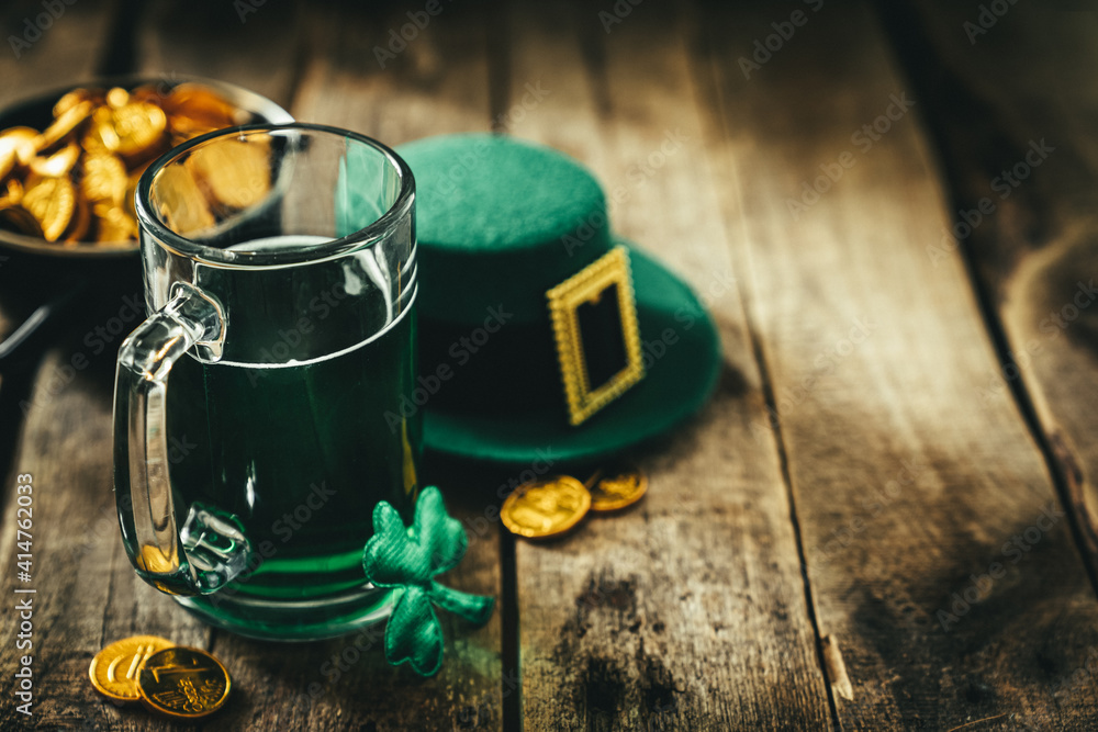St. Patricks day concept - green beer and symbols, rustic background. Part invitation. - obrazy, fototapety, plakaty 