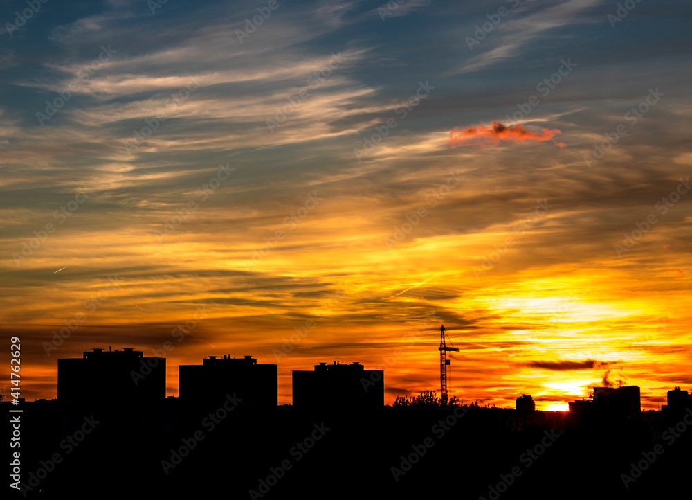 Fototapeta premium Townscape with clouds on sunset, nature background