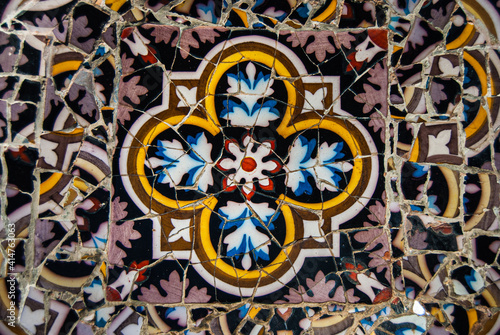 Mosaic made with colorful tiles with flower shapes
