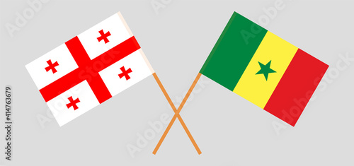 Crossed flags of Georgia and Senegal