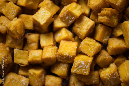 Panelle are tasty and delicious round pancakes made of chickpea flour, a typical Sicilian product