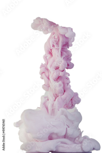 Ink dropped into the water and photographed while in motion. Paint swirling in water. Pink and white cloud and smoke of paint in water isolated on white background.