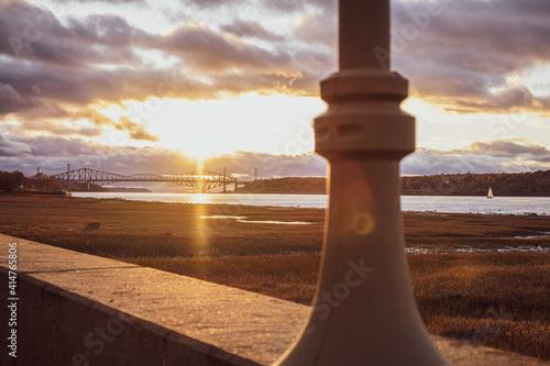 sunset over a bridge