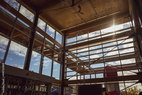 sun shining through windows in open design building