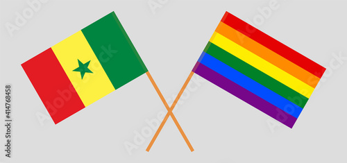 Crossed flags of Senegal and LGBTQ