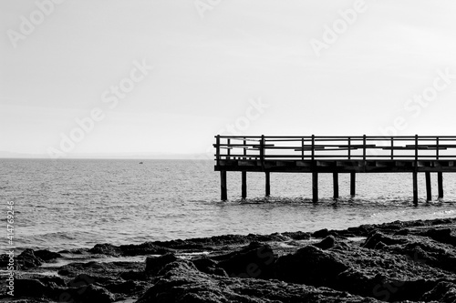 Old wooden pier on the shore