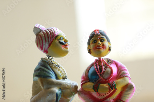 Tablou canvas Closeup shot of traditional Indian dolls on a blurred background