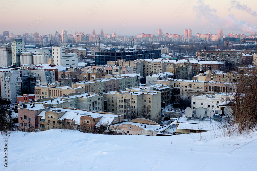 Obraz premium Winter view from the mountain to the districts of Kiev, the capital of the country of Ukraine