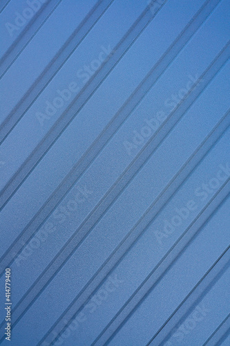 Blue background with diagonal stripes in the vertical plane
