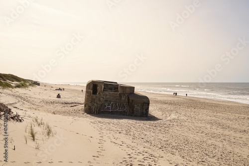 bunker ruin at beach near Houvig, Jutland, Denmark, ocean in background