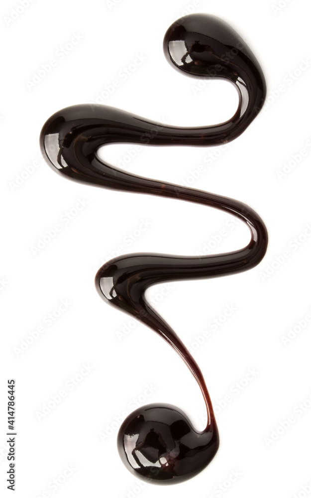 Fototapeta premium Chocolate syrup drop isolated on white background. Top view. .