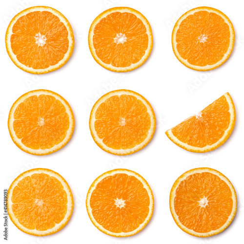 Seamless pattern of orange fruit slices. Orange slices isolated on white background. Food background. Flat lay  top view.