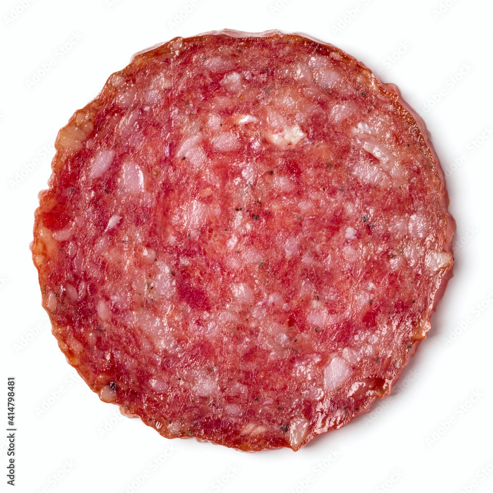 Slice of salami isolated on white background closeup. Slice of salami isolated on white background closeup.
