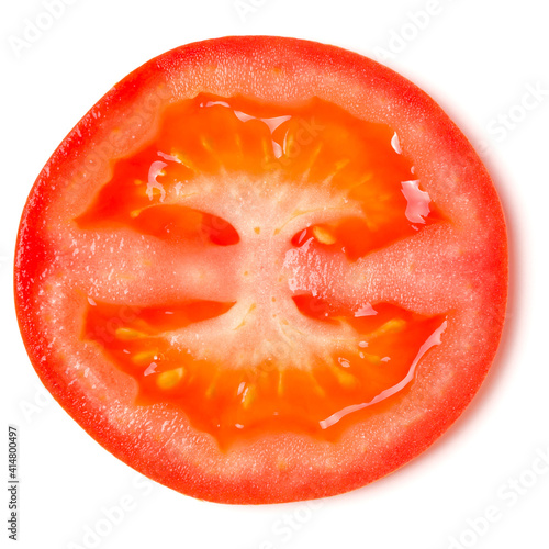 Slice of tomato isolated on white background. Top view, flat lay.