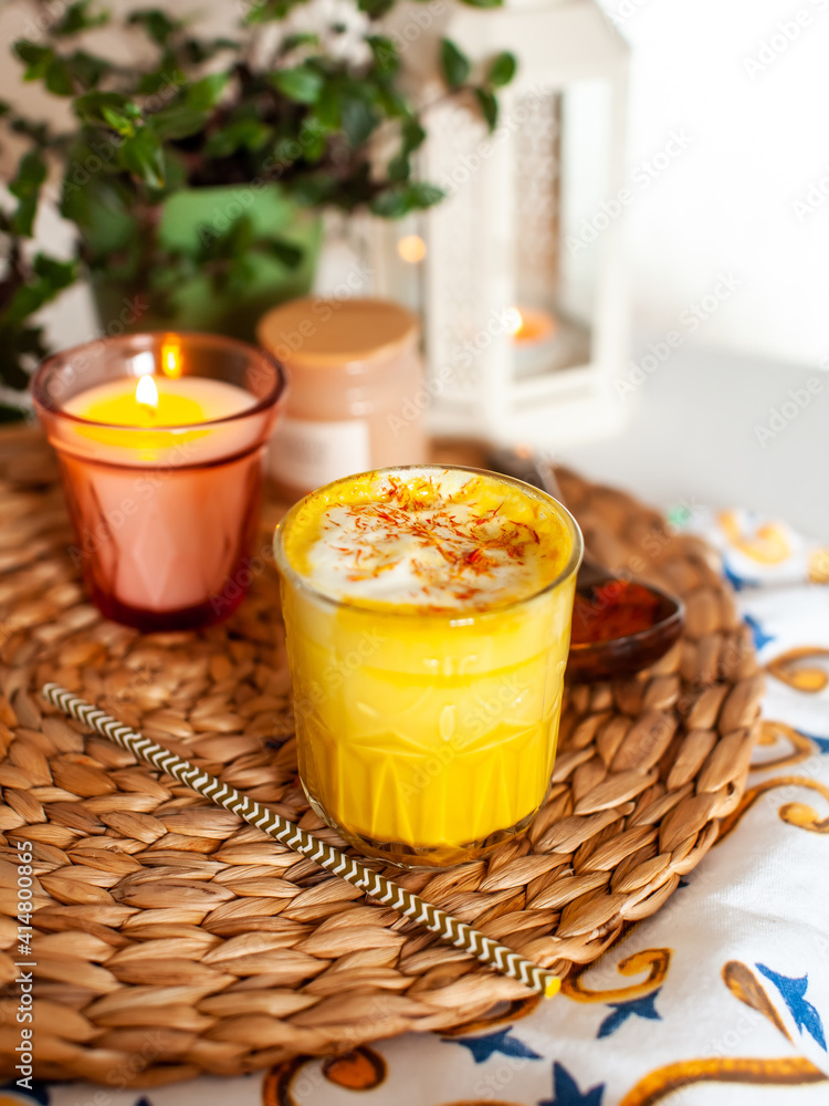 sunny turmeric latte on a cozy background