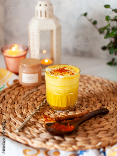 sunny turmeric latte on a cozy background