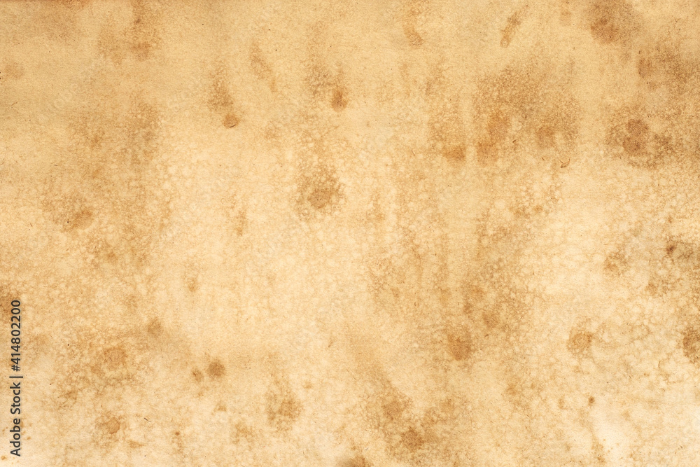Old brown paper grunge background. Abstract liquid coffee color. Old brown paper grunge background. Abstract liquid coffee color.