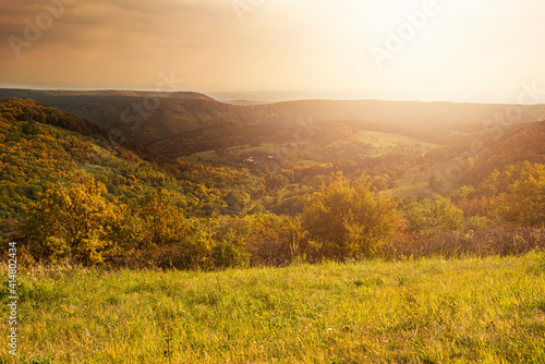 Green field and hilly landscape during summer.Scenic view.