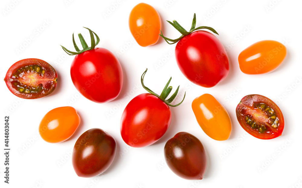 Fototapeta premium various colorful tomatoes isolated on white background. Top view, flat lay. Creative layout.