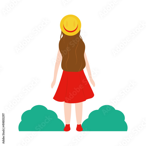woman of back standing with hat, colorful design