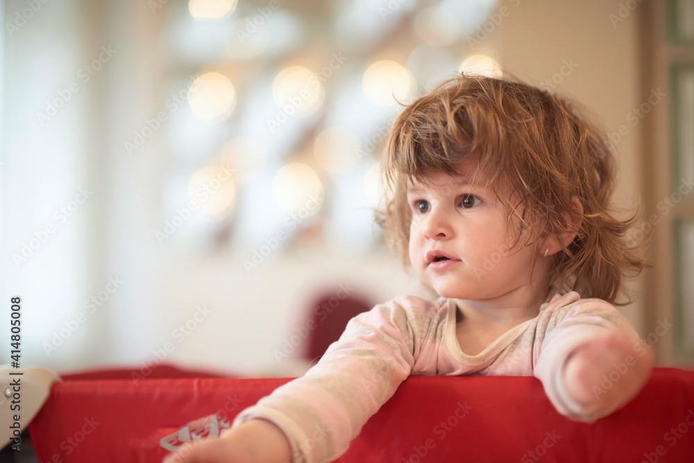 little baby girl with strange hairstyle and curlers little baby girl with strange hairstyle and curlers