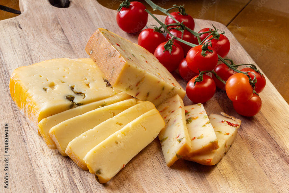 Soft cheese with olives and cheese with chili peppers with tomatoes and rosemary – wood Soft cheese with olives and cheese with chili peppers with tomatoes and rosemary – wood