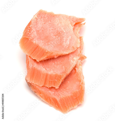 smoked salmon segments isolated on white background cutout. Prepared fish fillet fibres.