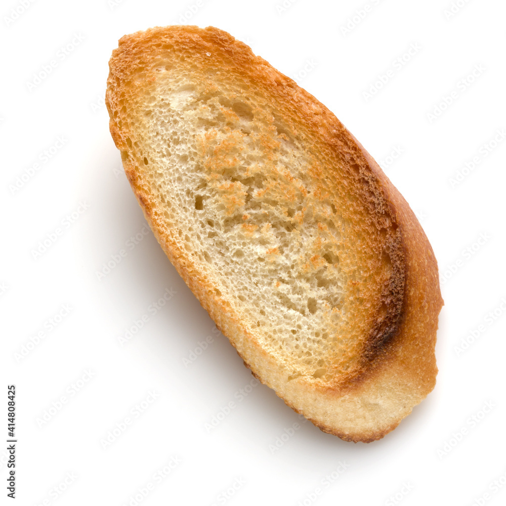 Toasted baguette slice isolated on white background close up. Toast, crouton. Top view.. Toasted baguette slice isolated on white background close up. Toast, crouton. Top view..