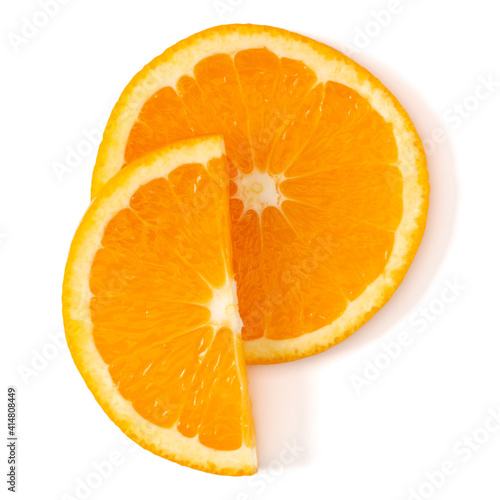 Orange fruit slice layout isolated on white background closeup. Food background. Flat lay, top view..