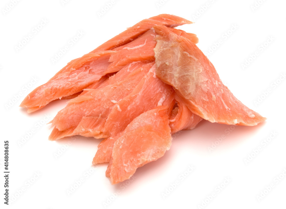 smoked salmon segments isolated on white background cutout. Prepared fish fillet fibres. . smoked salmon segments isolated on white background cutout. Prepared fish fillet fibres. .