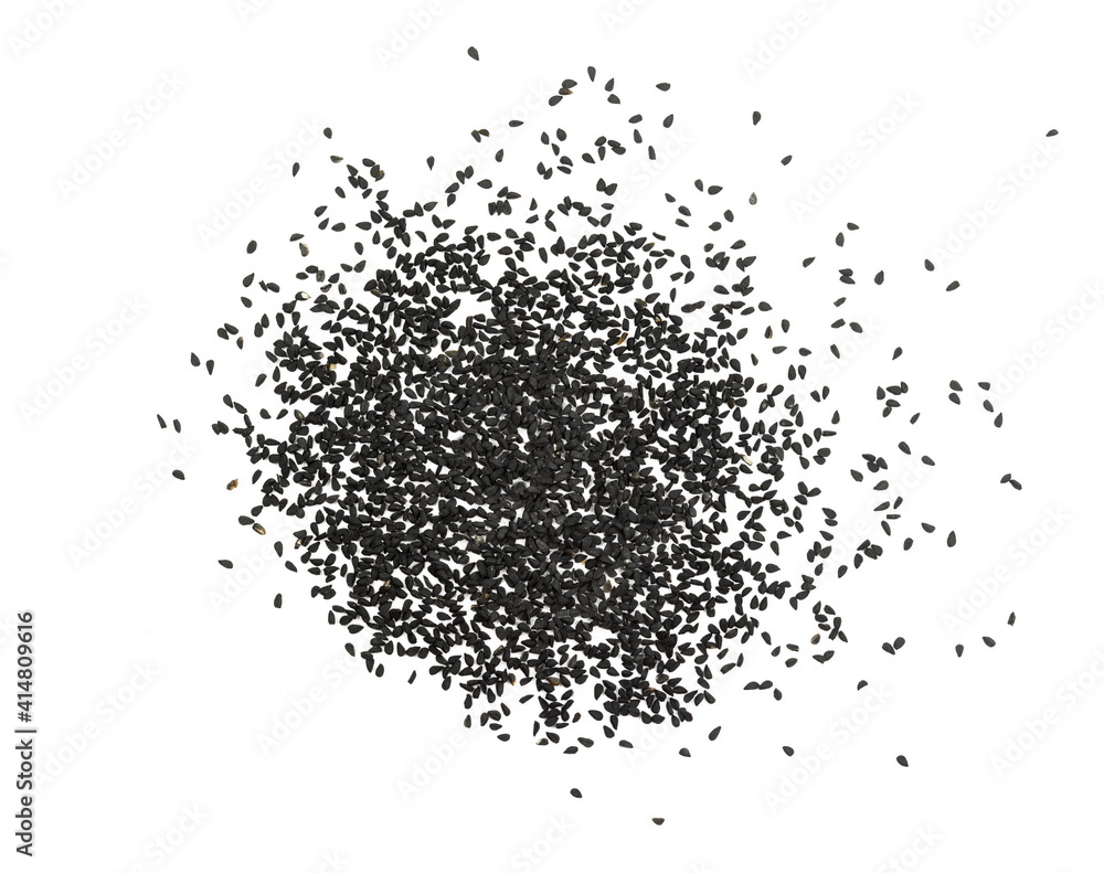 Heap of black nigella seeds. Pile of black cumin seeds spice isolated on white background.