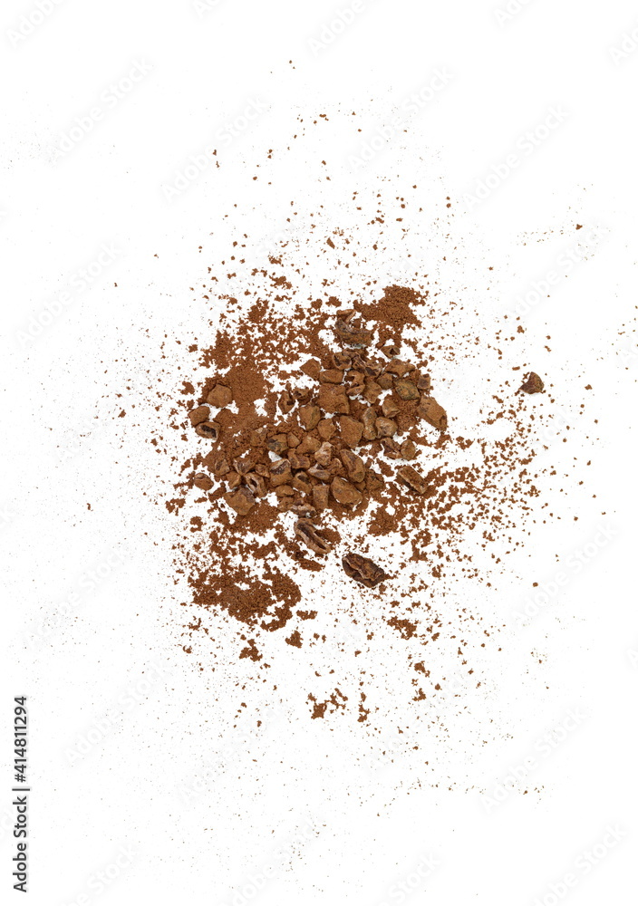 Cocoa nibsand cocoa powder isolated on white. A pieces of broken cocoa beans isolated on white background.