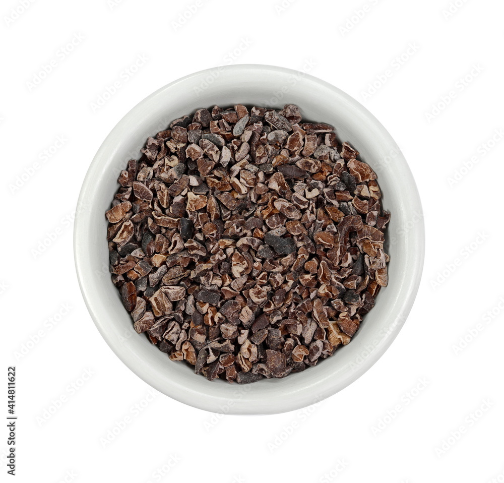 Cocoa nibs in a bowl, a pieces of broken cocoa beans isolated, top view Cocoa nibs in a bowl, a pieces of broken cocoa beans isolated, top view
