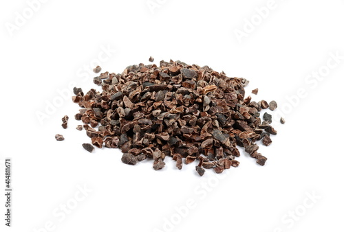 Cocoa nibs, a pieces of broken cocoa beans isolated, top view