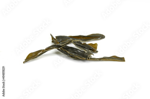 Dried kombu seaweed Japanese dry kelp isolated on white background